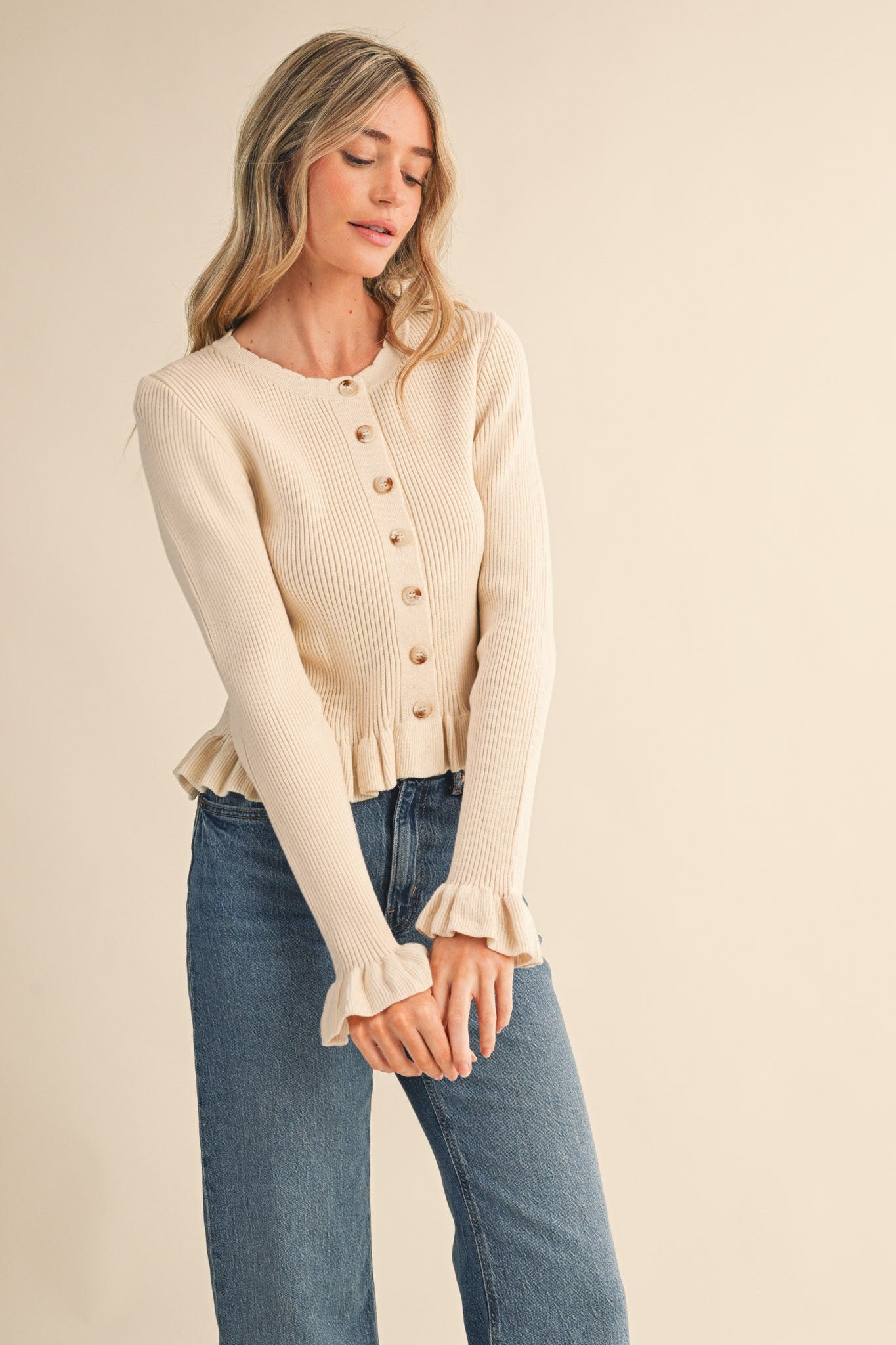 Regina Ruffled Hem Ribbed Knit Sweater Egg Shell